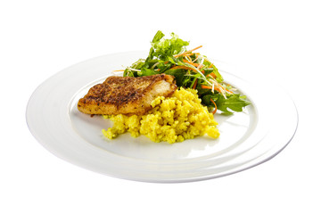 Roasted bass with creamy rice on a white background