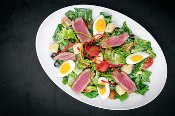 fresh seared raw tuna mixed vegetable salad  with mustard sauce