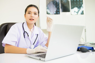 Healthcare And Medicine. Doctor using a laptop