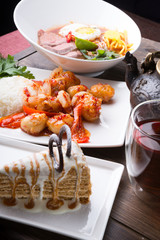 Asian lunch served on a wooden table