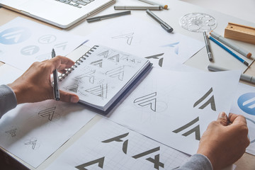 Graphic designer development process drawing sketch design creative Ideas draft Logo product...