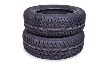 Brand new winter tire isolated on white