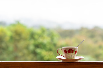  A cup of coffee with a refreshing background