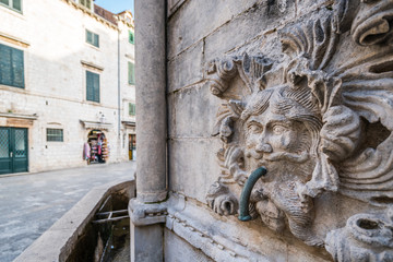 Fototapeta na wymiar Dubrovnik Stradun street Onofrio Fountain