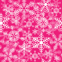 Seamless texture with snowflakes on a pink background
