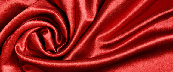 Twisted red satin fabric