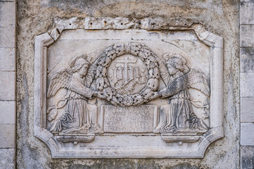 Old plaque depicting angels