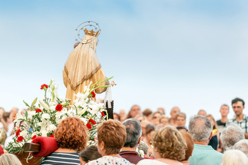 15 JULY 2018, TARRAGONA, SPAIN: People at celebration of religious holiday with Virgin Mary - obrazy, fototapety, plakaty