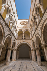 Fototapeta na wymiar Arched inner courtyard in Sponza Palace