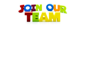 Join Our Team text written with colourful wooden letters, isolated over white with copy space