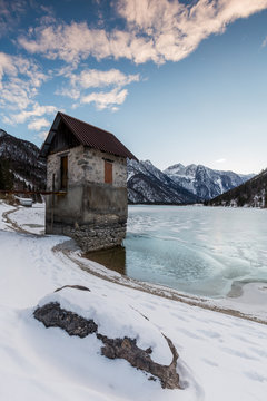 Wintertime to the Lago di Cave del Predil, lake Tarvisio, Udine, Italy
