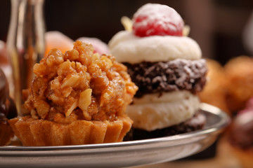 Catering sweets, closeup of various kinds of cakes on event or wedding reception