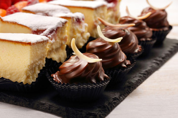 Catering sweets, closeup of various kinds of cakes on event or wedding reception