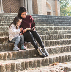 My daughter adores when I read stories in front of the church on Sunday