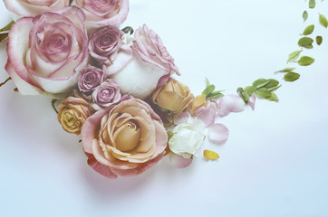 Obraz na płótnie Canvas Live roses flowers frame. Beautiful floral background. Vintage filtered Template to spring holidays.