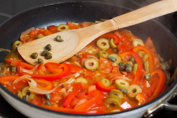 Frying pan with chopped vegetables