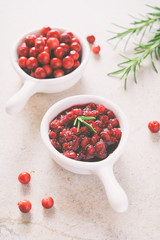 Cowberry sauce with rosemary and coconut sugar. Cranberry confiture. Spicy berry jam to meat, turkey. Autoimmune Paleo. Diet healthy food concept. Cereals Gluten Dairy free. Copy space.