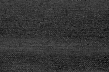 Fototapeta premium Hintergrund Ziegelsteinwand sehr dunkel sehr viele Ziegelsteine Low-key - Background brick wall very dark Low-key