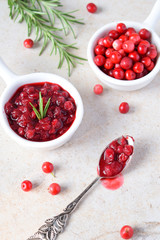 Cowberry sauce with rosemary and coconut sugar. Cranberry confiture. Spicy berry jam to meat, turkey. Autoimmune Paleo. Diet healthy food concept. Cereals Gluten Dairy free. Copy space.