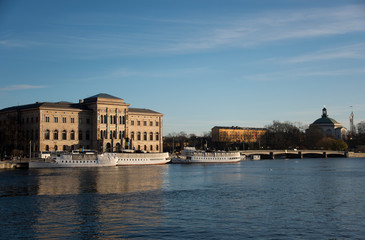 Obraz premium Landmarks and boats at the waterfront of Stockholm