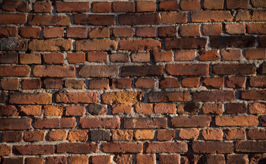 Old brick wall with shadows