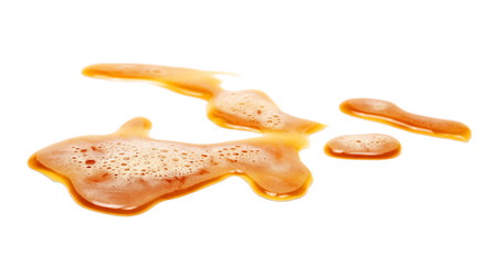 Spilled beer puddle with foam isolated on white background and texture, clipping path