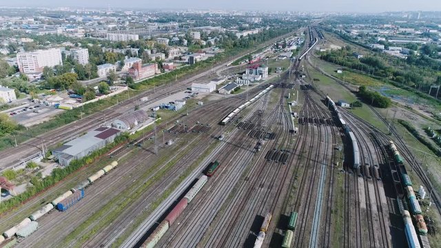 Logistics concept. many ways, freight trains re sorting. industrial railway landscape. Railroad tracks. Top view shooting with quadrocopter.