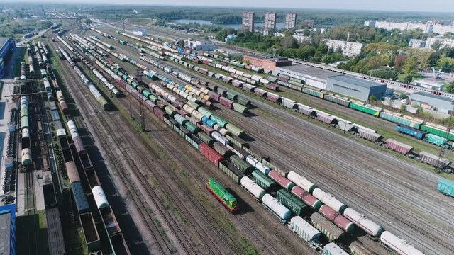 Logistics concept. many ways, freight trains re sorting. industrial railway landscape. Railroad tracks. Top view shooting with quadrocopter.