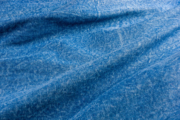Naklejka premium Blue washed faded jeans texture with seams