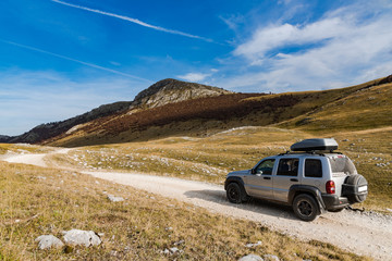 Fototapeta na wymiar Off road expedition to rural unspoiled Bosnia steppe