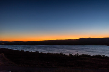 Obraz premium Sunrise over Lower Waterton Lake, Waterton Lake National Park, Alberta, Caanda