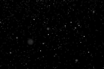 Obraz premium Falling snow isolated on black. Snowfall texture. Place in over picture in screen mode.