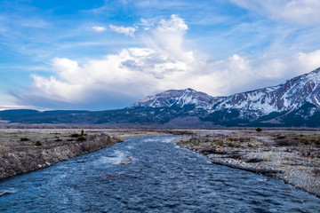 Water flowing to the mountains along Pass Creek, Waterton Lakes National Park, Alberta, Canada