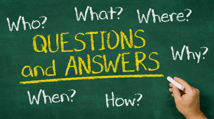 Hand writing on a chalkboard - Questions and Answers