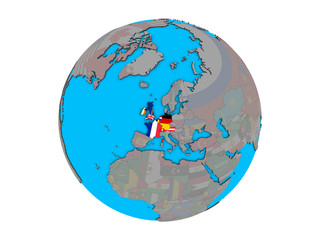 Naklejka premium Western Europe with embedded national flags on blue political 3D globe. 3D illustration isolated on white background.