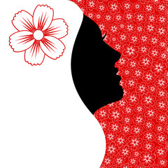 Beautiful female profile on a floral background