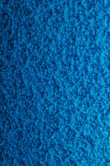 blue hammered metal background,abstract metalic texture, sheet of metal surface painted with hammer paint.