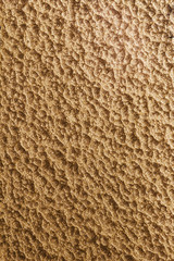 Gold hammered metal background,abstract metalic texture, sheet of metal surface painted with hammer paint