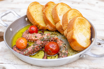 delicious octopus grilled with toasts