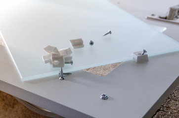 Glass on the furniture facade is mounted with glass clips