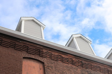 Boarded up vacant brick industrial building