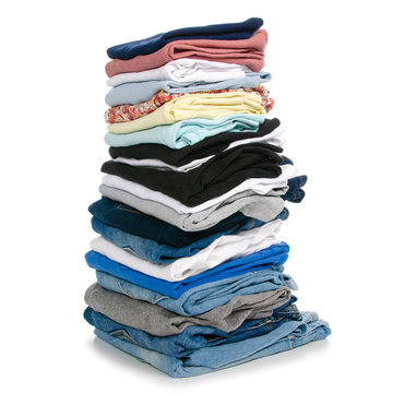 A stack of clothes jeans t-shirt shirt on a white background. Isolation