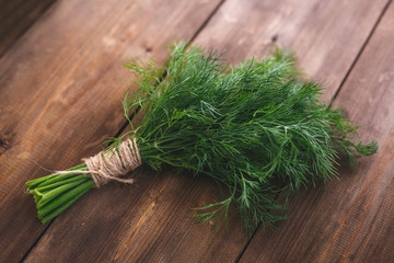 A bunch of dill on the village table. Healthy Eating
