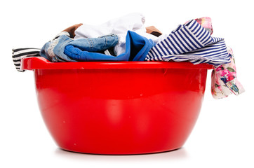 Basket plastic basin with clothes laundry on white background isolation