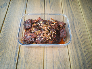 Selective focus of special marinated venison ribs with seven type of spices and herbs called Dendeng Tulang Rusuk Rusa in malay for dinner and lunch at the top of the table.