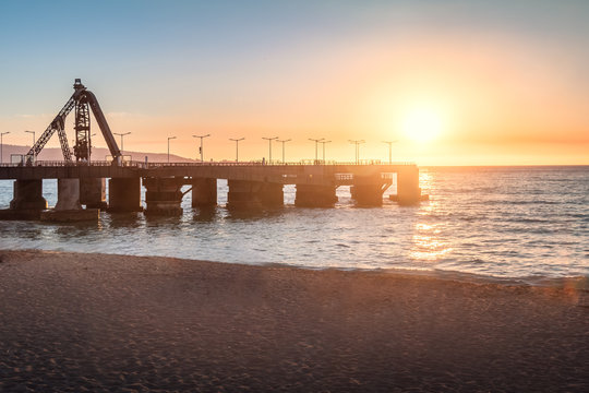 Muelle Vergara Pier and El Sol beach at sunset - Vina del Mar, Chile