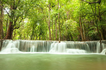Beautiful and Breathtaking green waterfall at the tropical rainforest, Erawan's waterfall, Located Kanchanaburi Province, Thailand