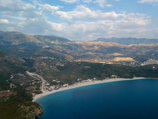 Aerial view of empty beach (Livadhi Beach) in Himara, Albania (Albanian Riviera)