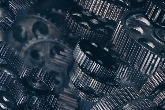 metal gray gears/ Abstract mechanism from a variety of metal  gears of different sizes close-up