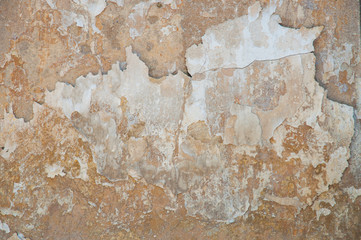 Stone grunge texture for background. A dirty not perfect old wall with cracks and peeling paint